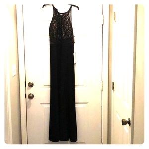 New formal gown with tags, size 13, never worn.
